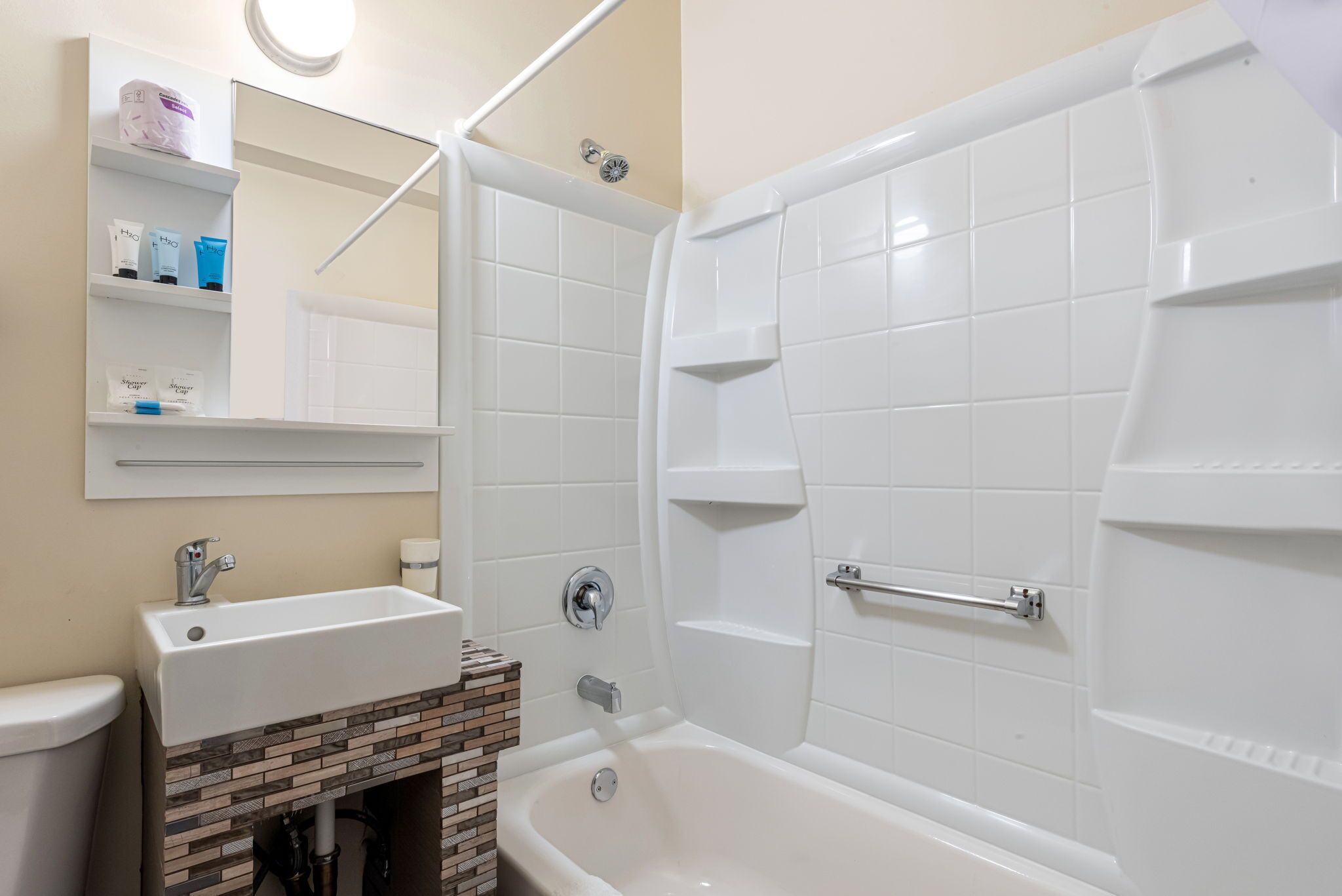 deluxe room, 2 queen beds | bathroom | combined shower/bathtub, free toiletries, hair dryer, towels