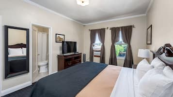 Deluxe Room, 1 King Bed, Non Smoking | Premium bedding, pillow-top beds, in-room safe, desk