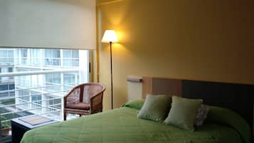 Design Studio Suite, 2 Bedrooms | 2 bedrooms, down comforters, in-room safe, soundproofing