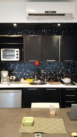 Fridge, microwave, oven, espresso maker