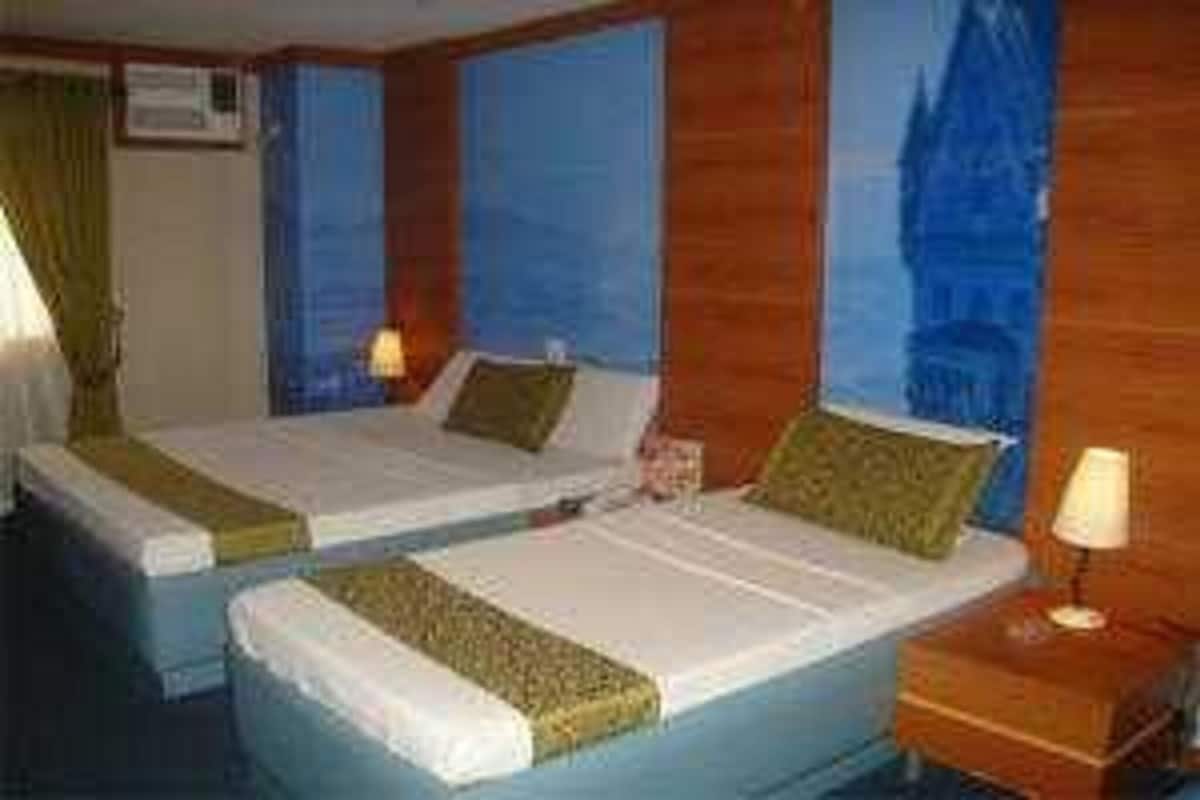 In-room safe, desk, laptop workspace, rollaway beds