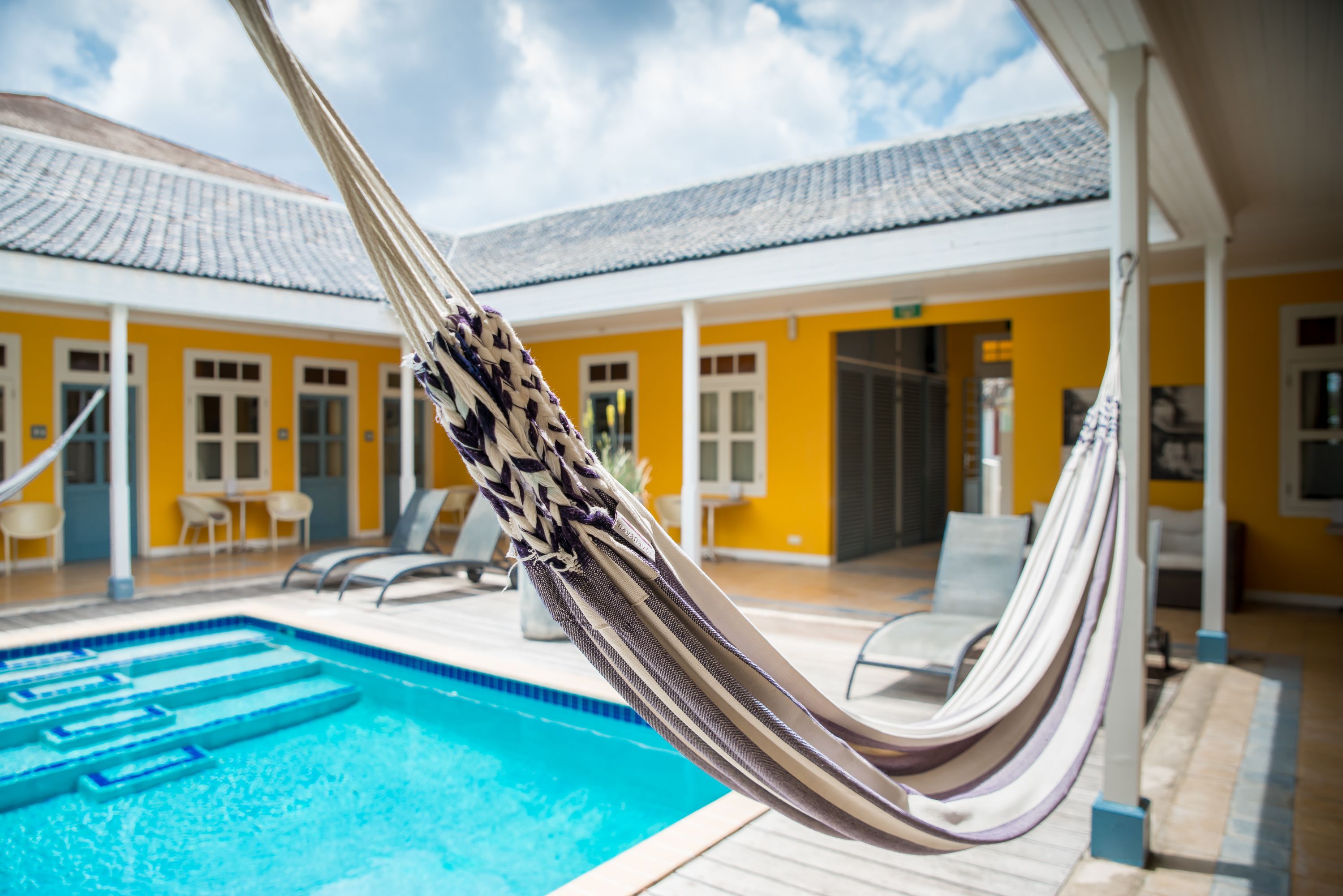 outdoor pool, pool loungers