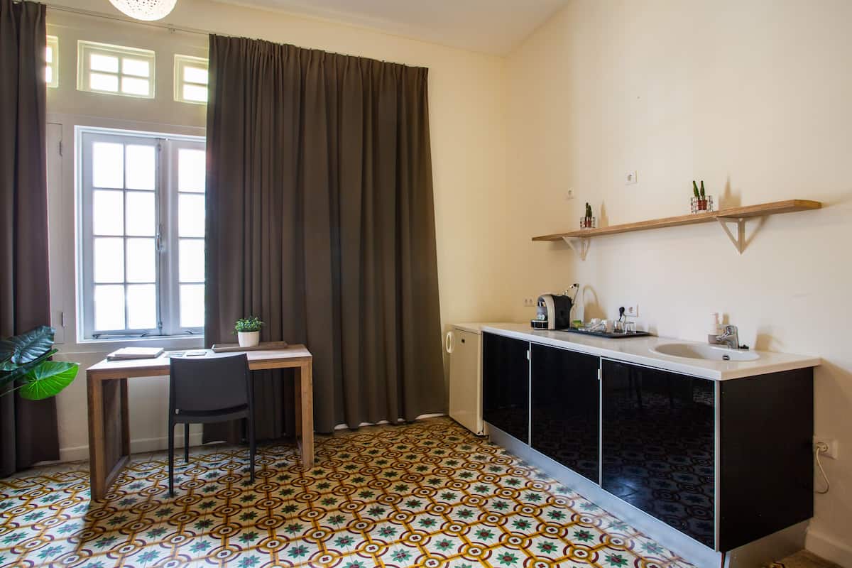 deluxe room | premium bedding, in-room safe, desk, iron/ironing board