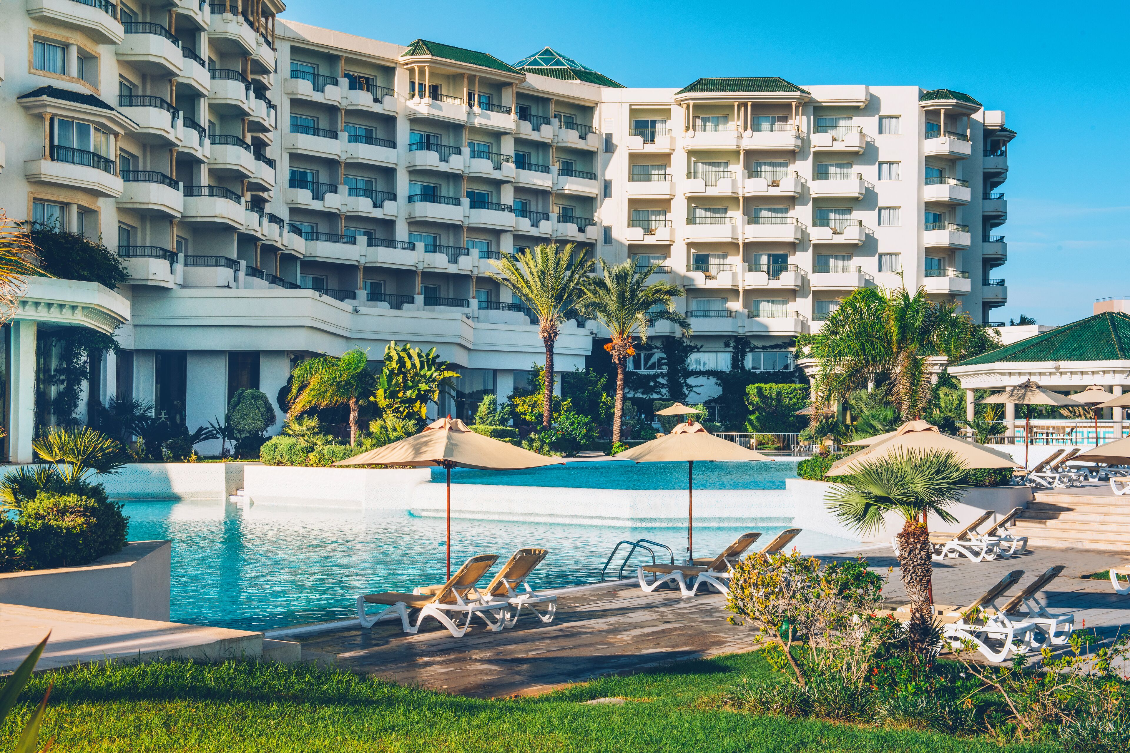 indoor pool, outdoor pool, pool loungers