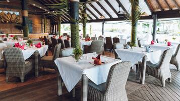 Breakfast, lunch, dinner served; international cuisine, beach views