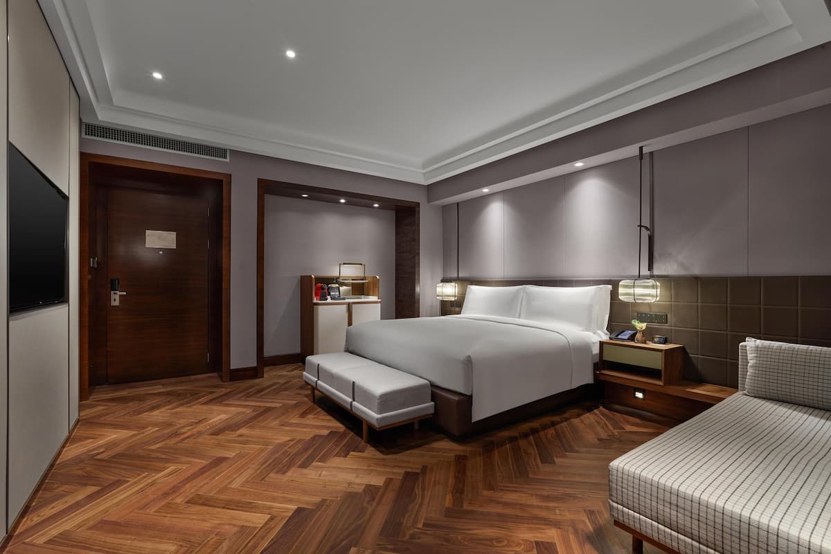 Ropa de cama de alta calidad, cubrecamas y minibar