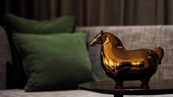 Premium bedding, down comforters, minibar, in-room safe