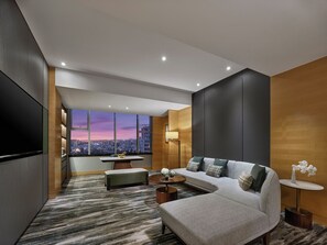 Deluxe-Suite, 1 King-Bett | Wohnbereich