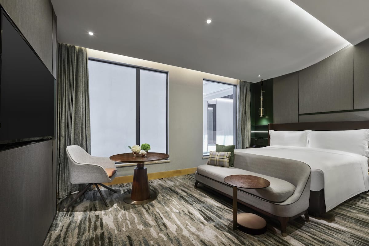 Ropa de cama de alta calidad, cubrecamas y minibar