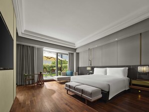 Premium bedding, down comforters, minibar, in-room safe