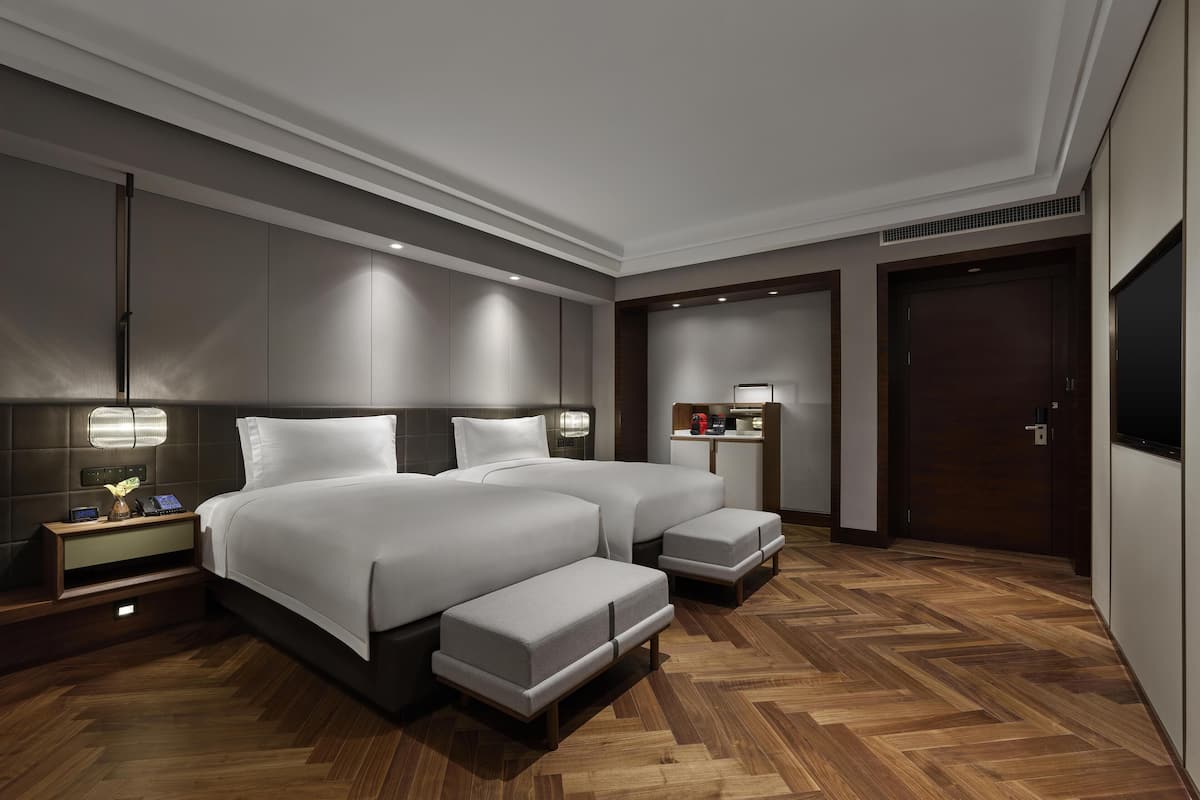 Ropa de cama de alta calidad, cubrecamas y minibar