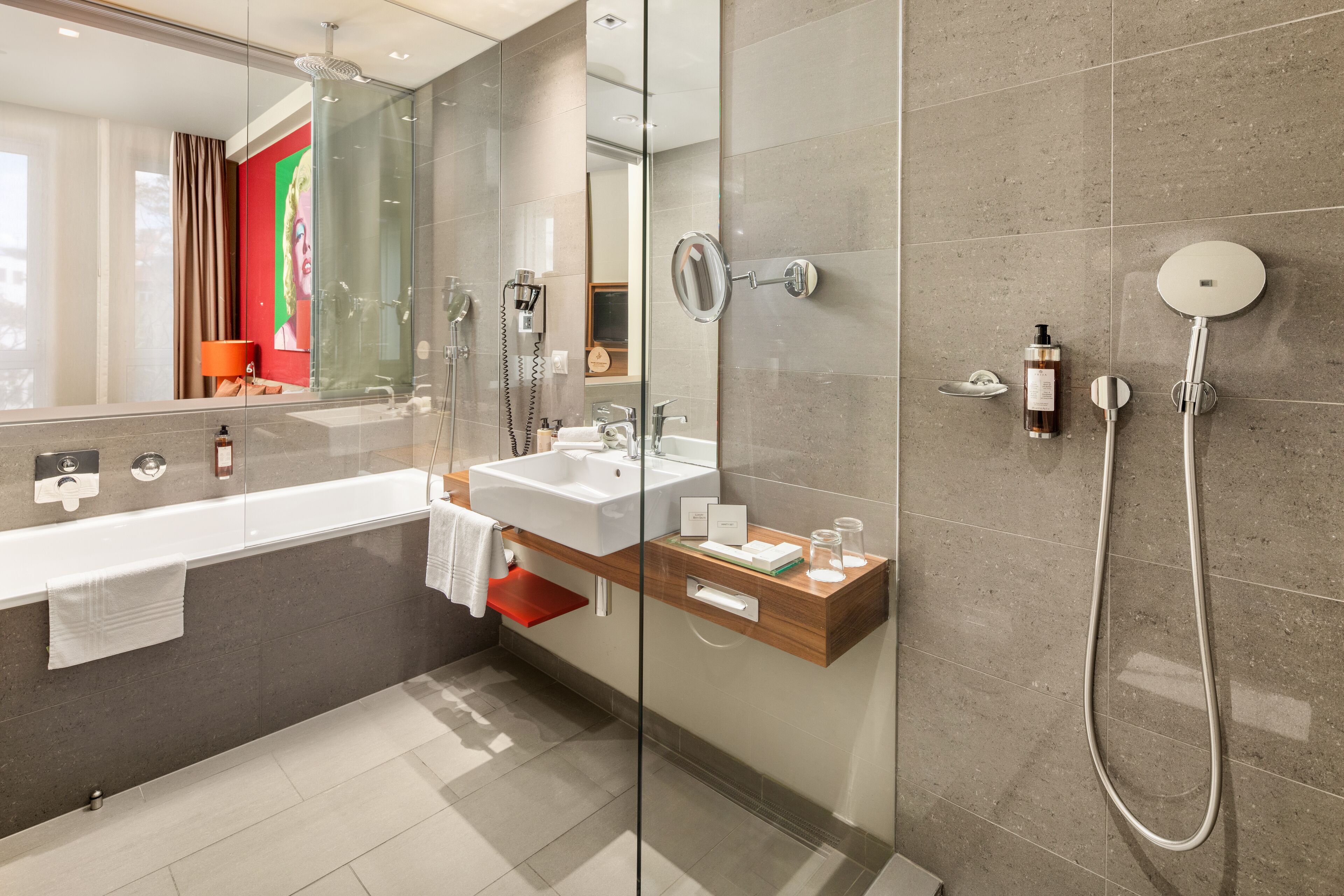junior suite, 1 king bed, non smoking | bathroom | free toiletries, hair dryer, towels