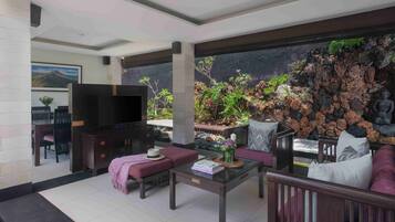 Suite Private Pool Villa | Living area | 37-inch plasma TV with cable channels, TV
