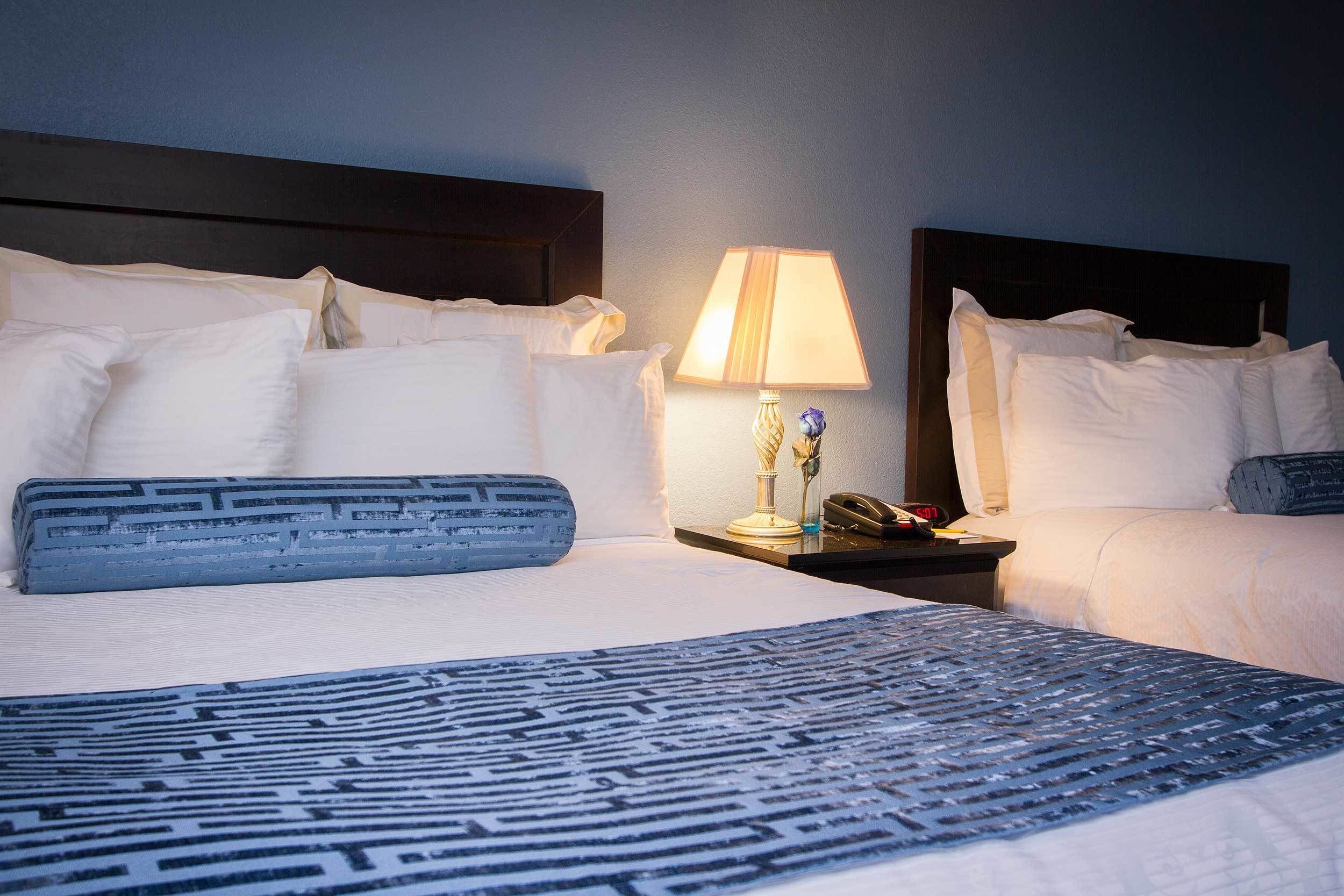 room, 2 queen beds | iron/ironing board, free wifi, bed sheets, alarm clocks