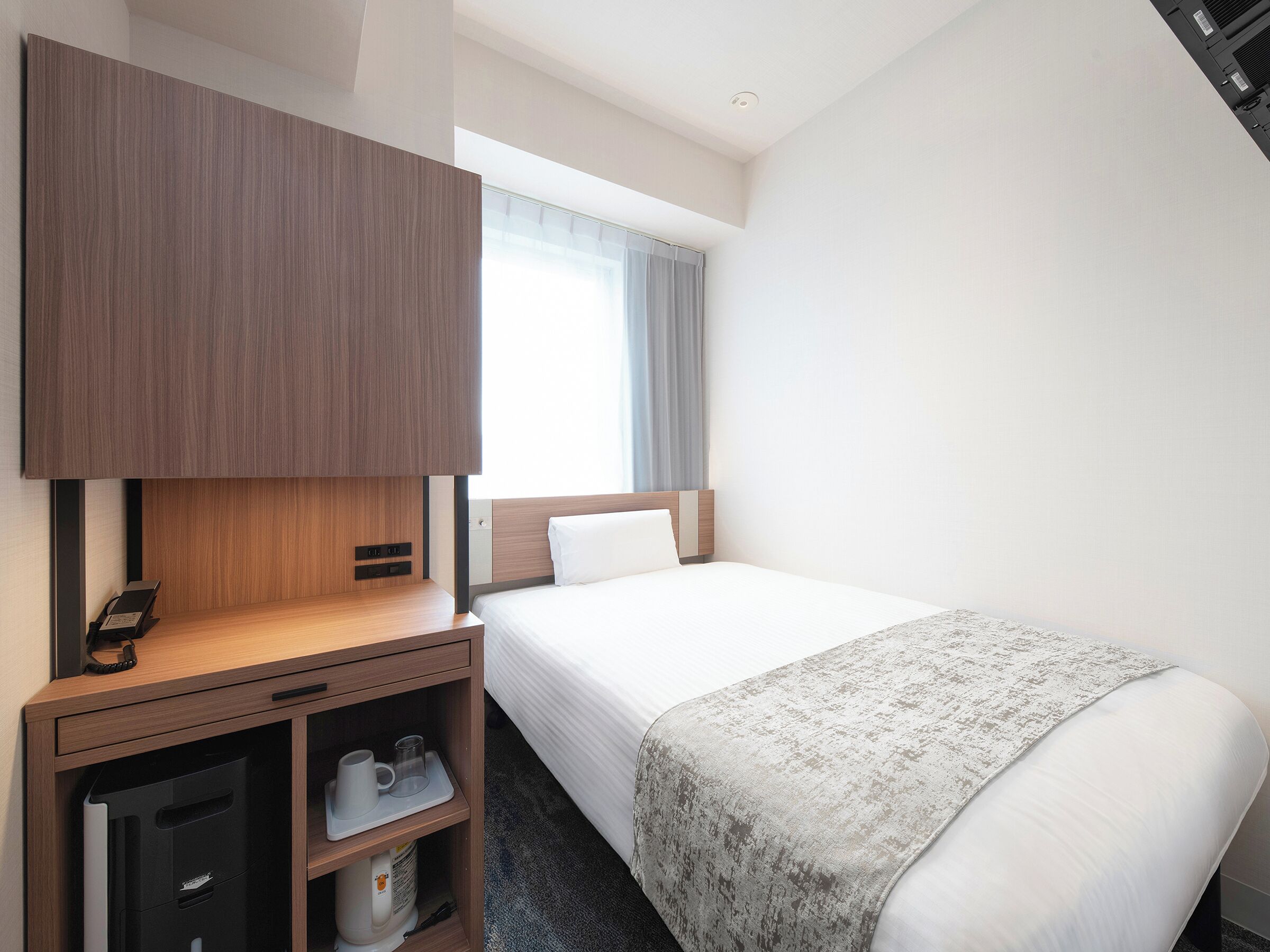 Daunenbettdecken, Schreibtisch, laptopgeeigneter Arbeitsplatz