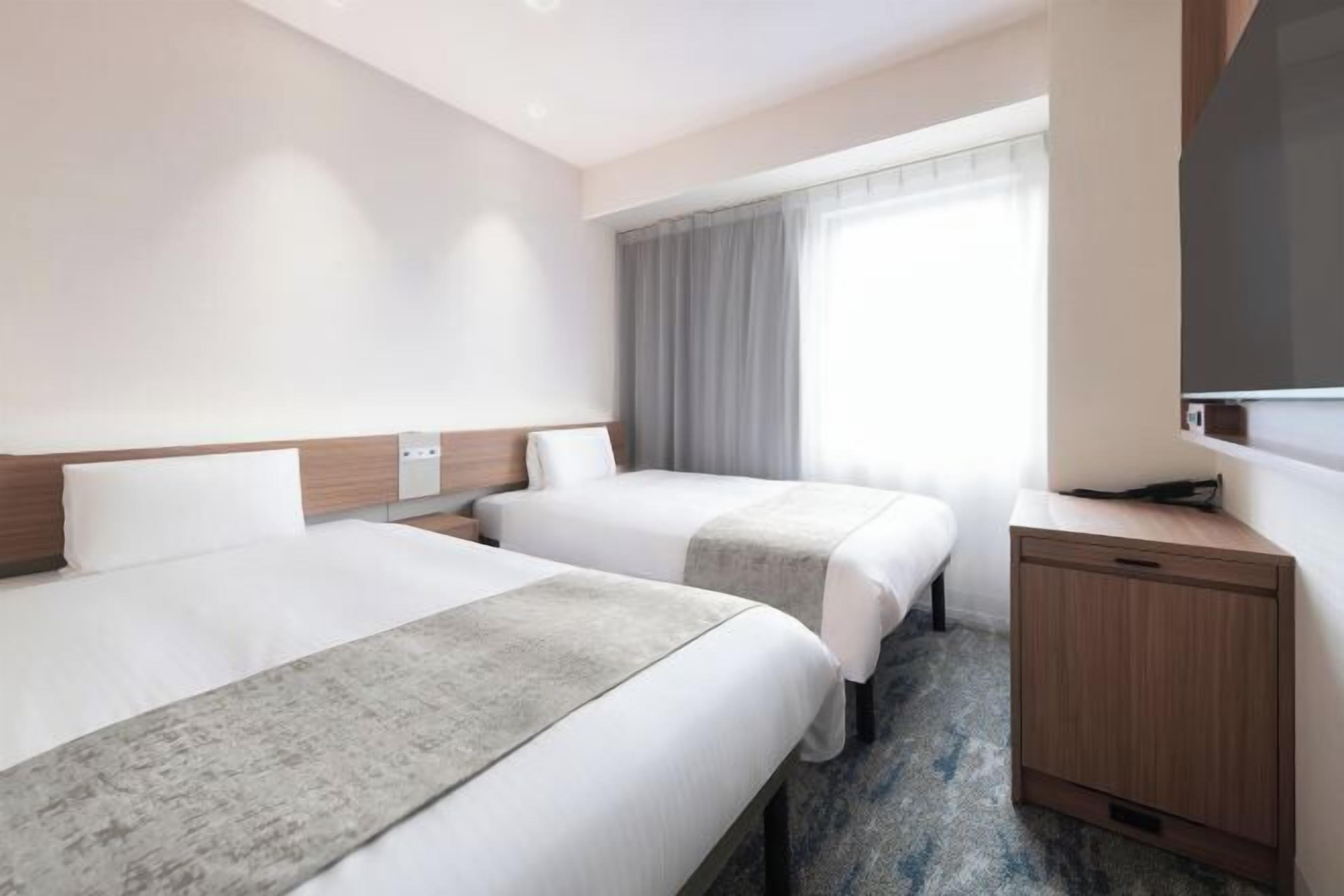 Down comforters, desk, laptop workspace, blackout drapes