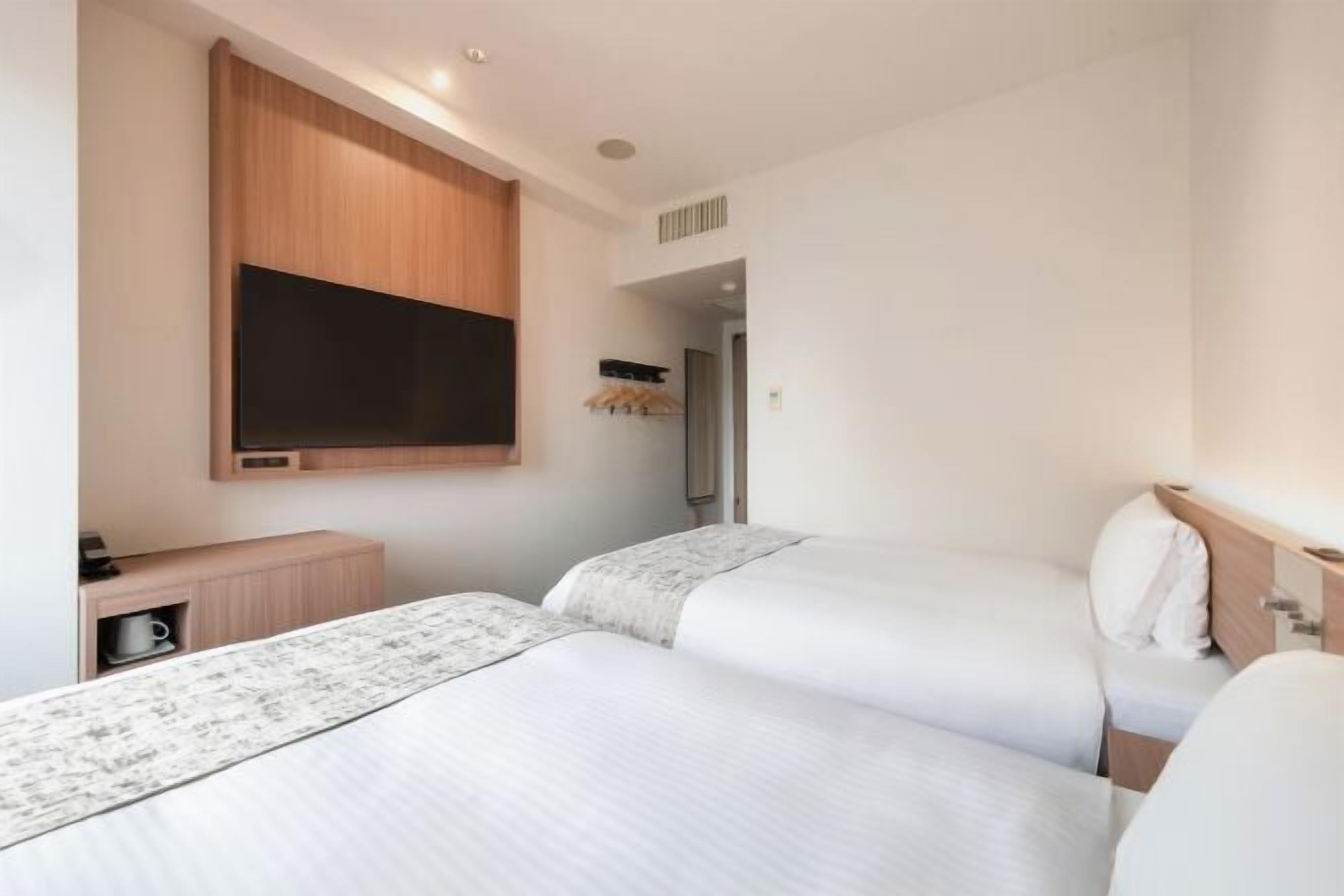 Down comforters, desk, laptop workspace, blackout drapes