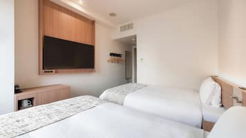 Down comforters, desk, laptop workspace, blackout drapes