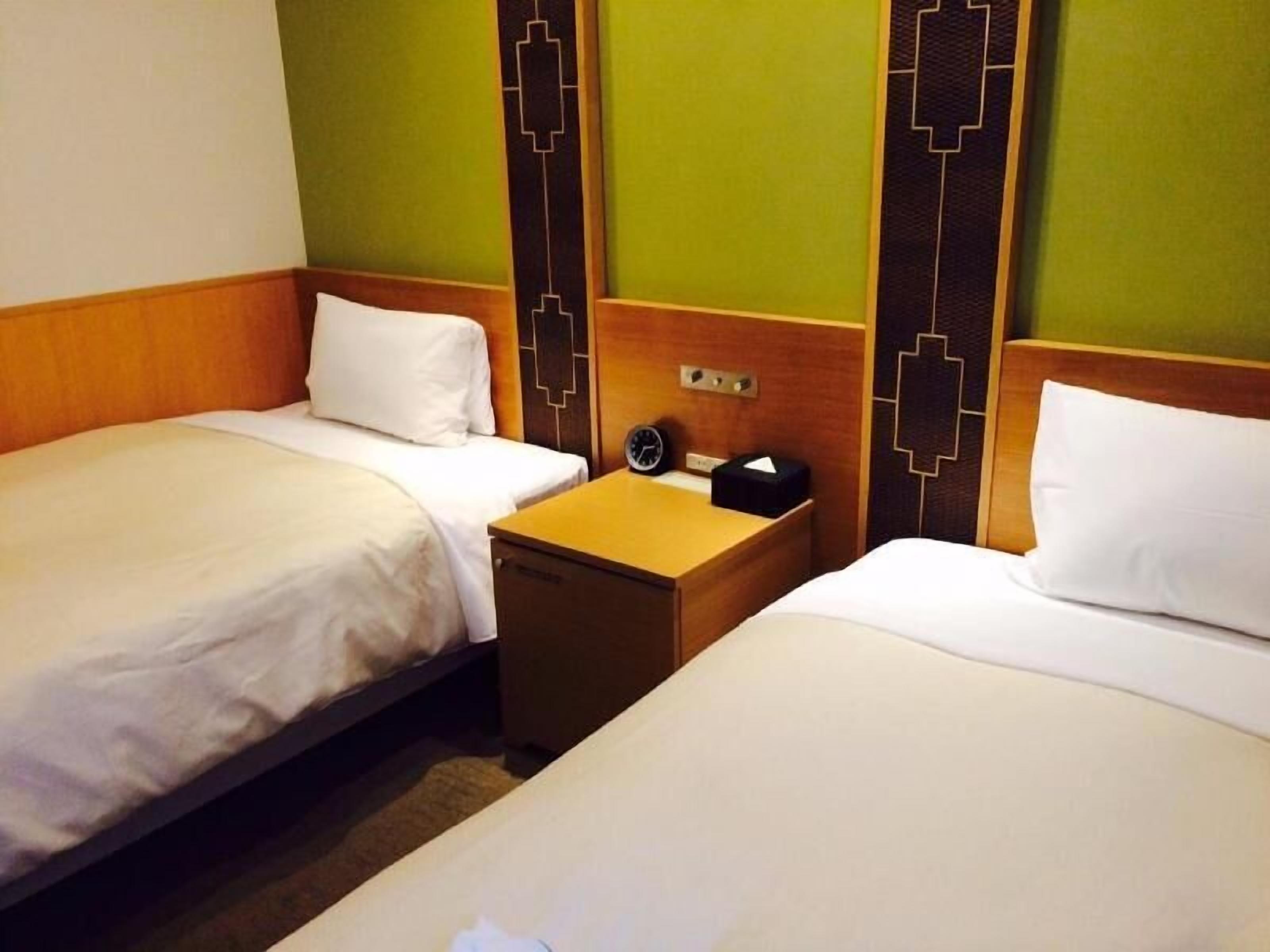 Down comforters, desk, laptop workspace, blackout drapes