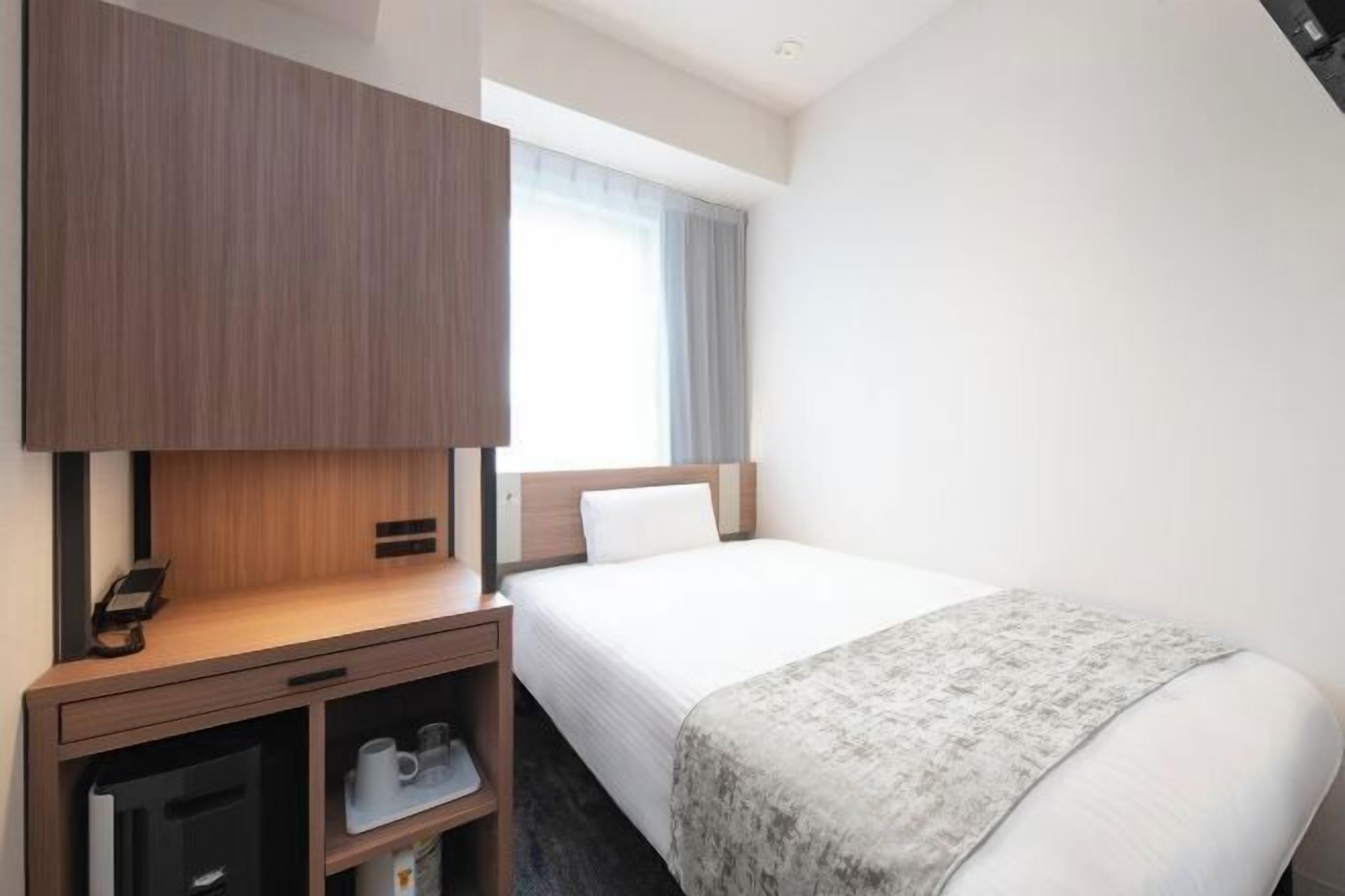 Down comforters, desk, laptop workspace, blackout drapes