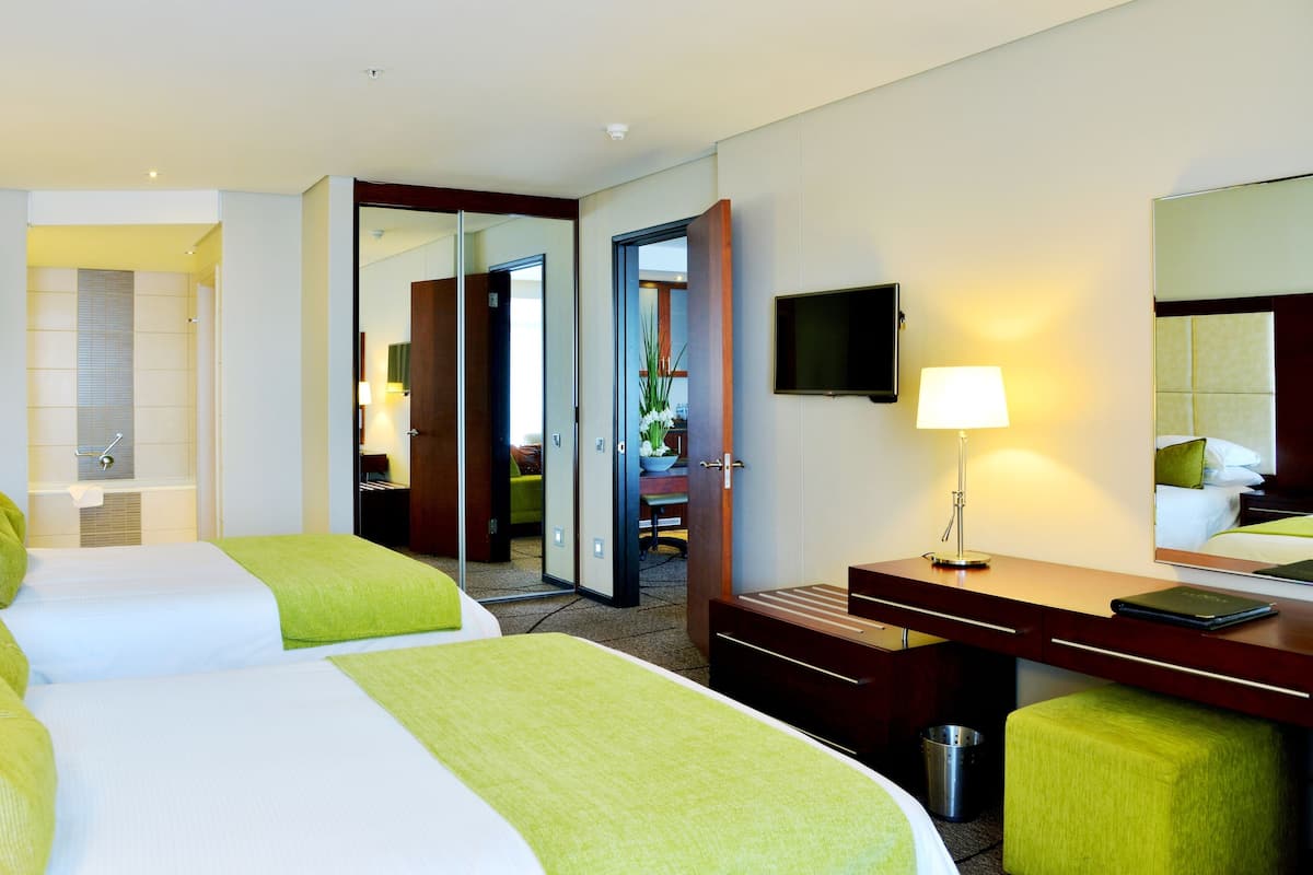 Executive Suite, 2 Double Beds | 1 bedroom, premium bedding, in-room safe, individually decorated