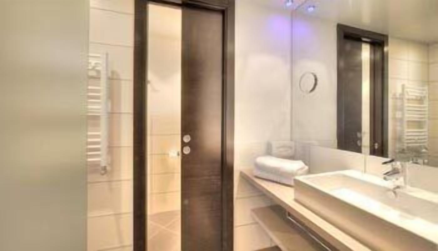 standard double room | bathroom | shower, hair dryer, bathrobes, slippers