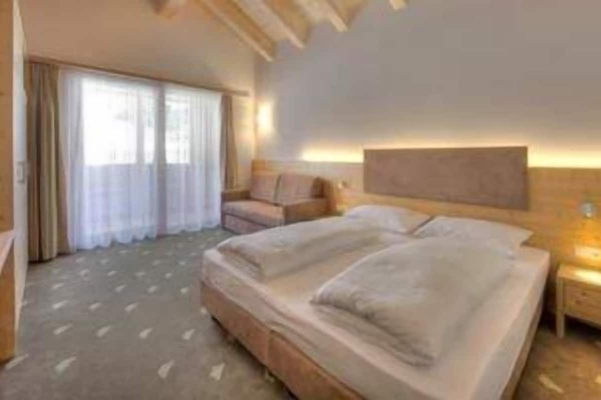 Double Room (Mansard) | In-room safe, blackout drapes, soundproofing, travel crib