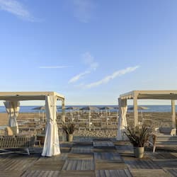 On the beach, sun-loungers, beach umbrellas