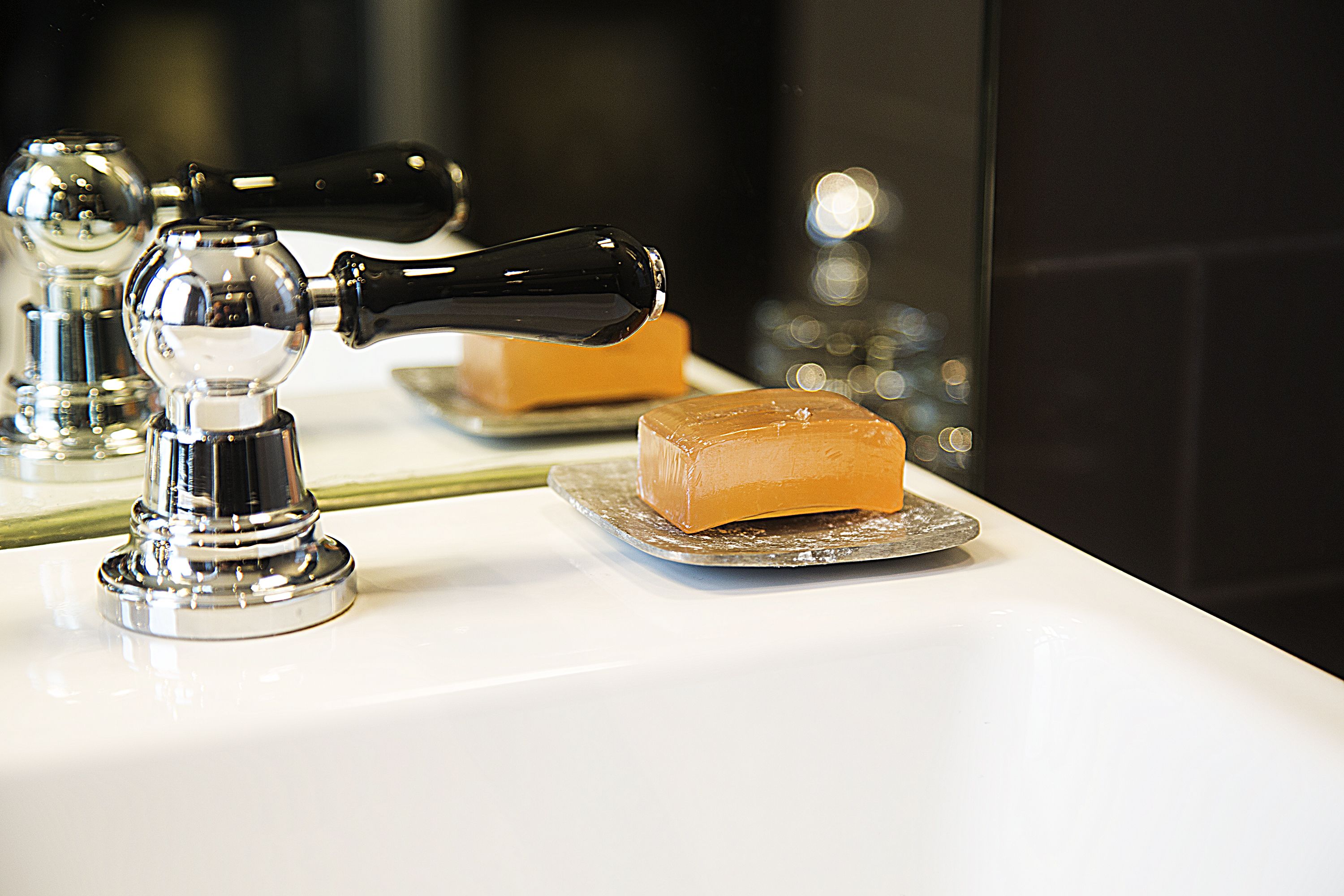 deluxe twin room | bathroom | rainfall showerhead, free toiletries, hair dryer, bathrobes