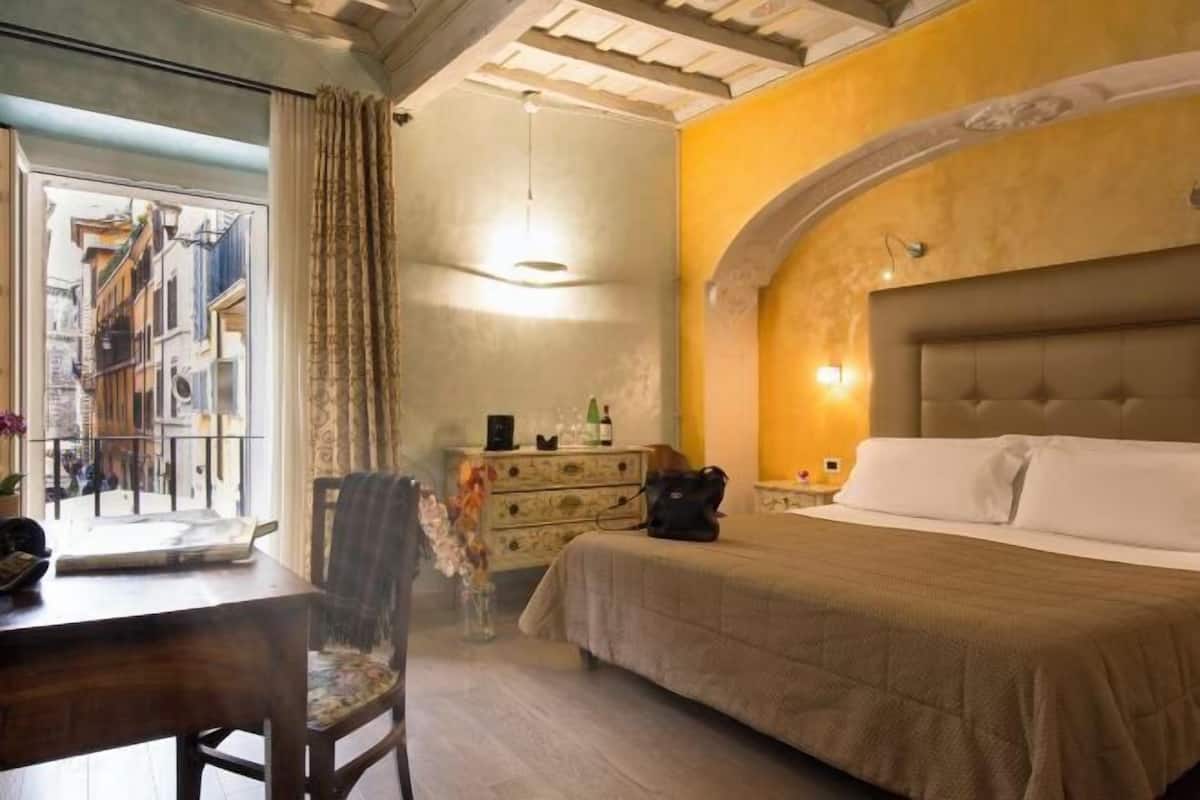 Memory-foam beds, minibar, in-room safe, desk