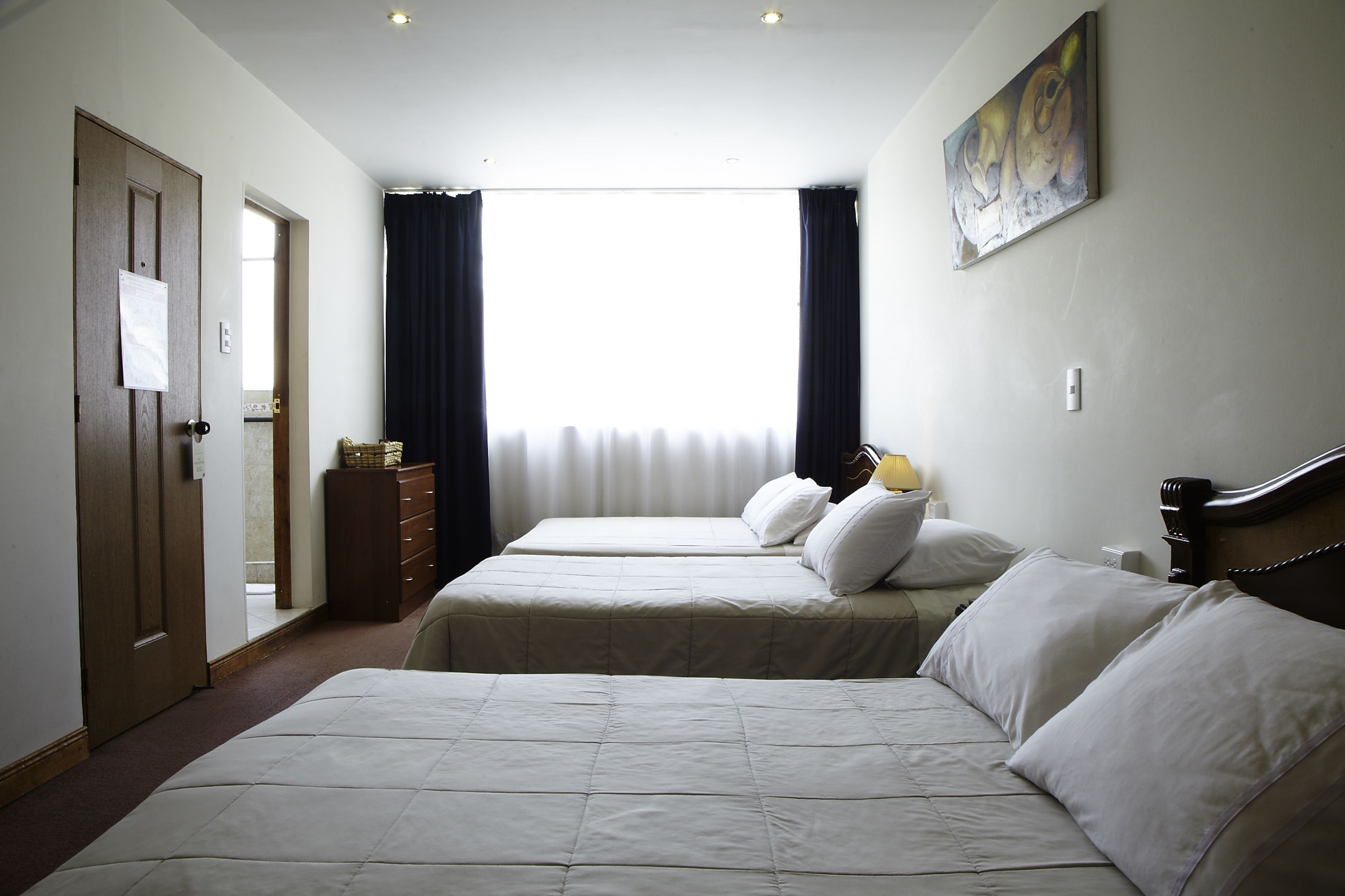 family room | minibar, in-room safe, desk, iron/ironing board