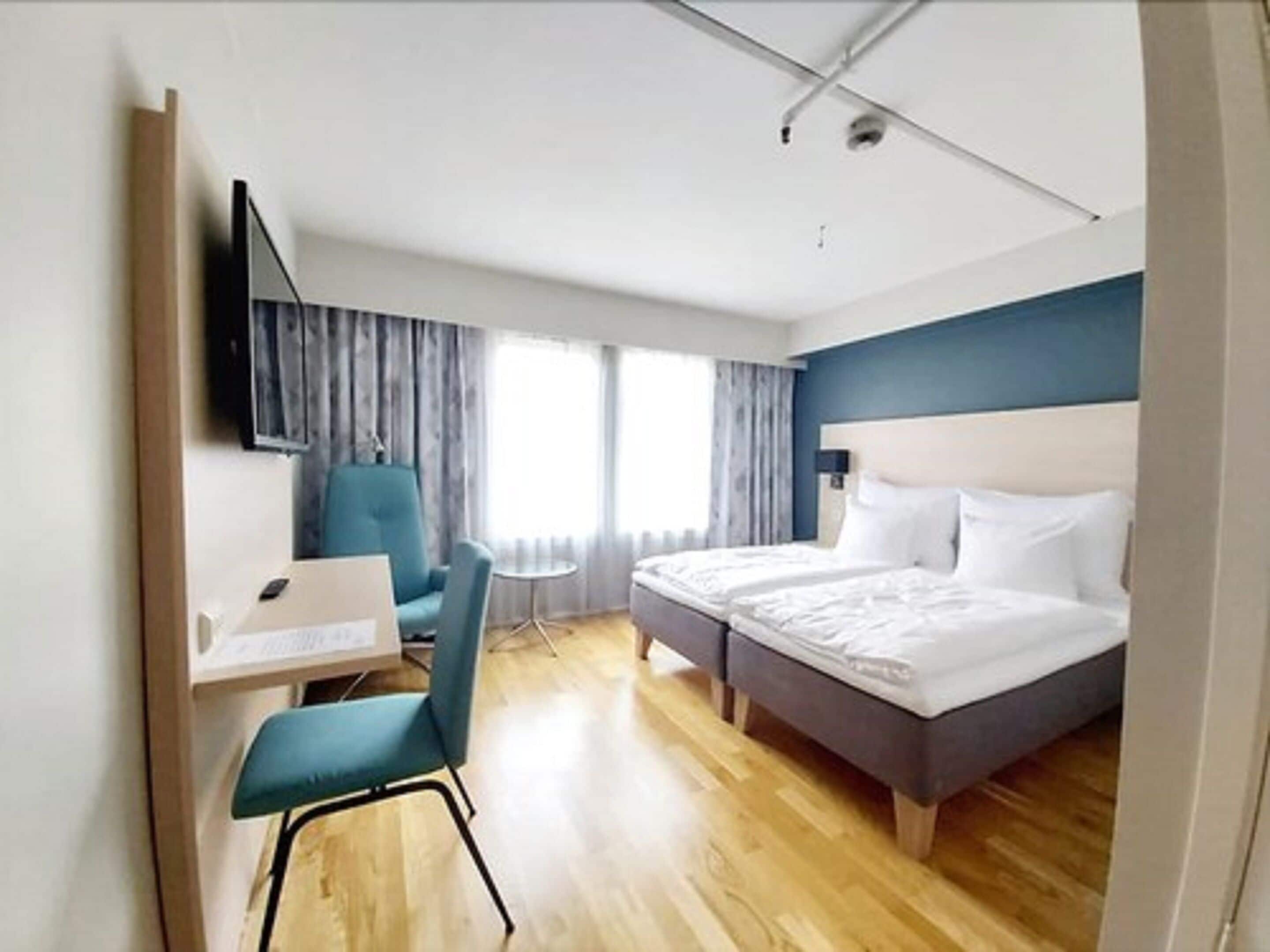 double room, river view | premium bedding, desk, laptop workspace, free wifi