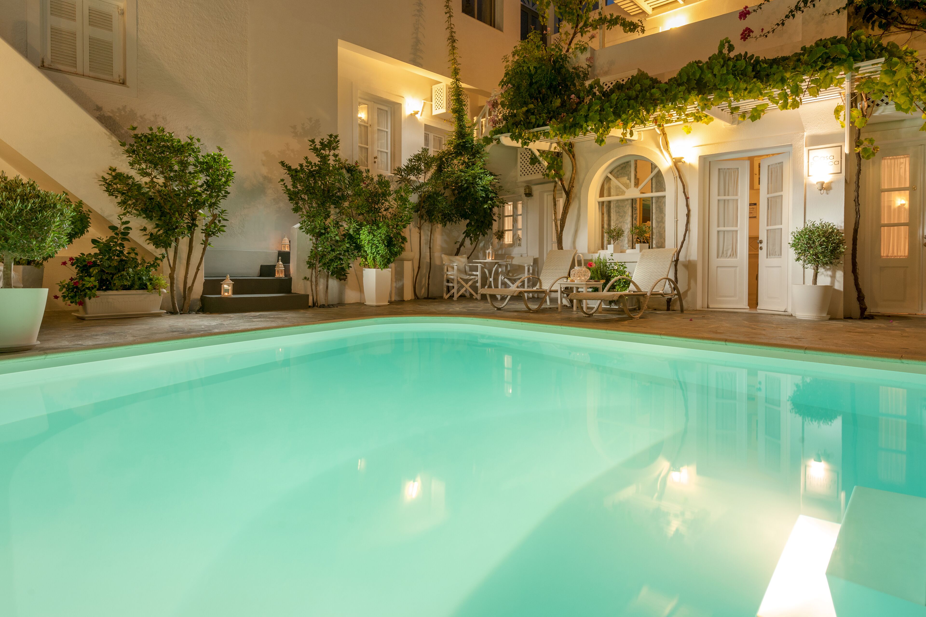 outdoor pool, open 8:00 am to 8:30 pm, pool umbrellas, pool loungers