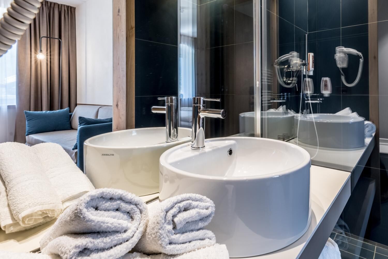 shower, hair dryer, bidet, towels