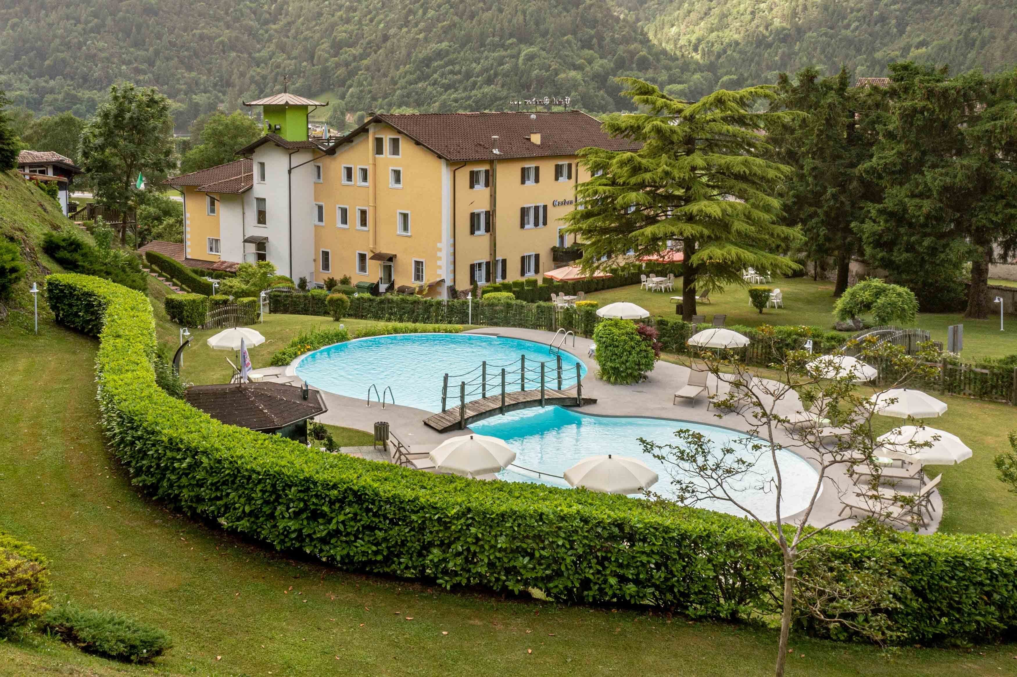 seasonal outdoor pool, open 8:00 am to 8:00 pm, pool umbrellas