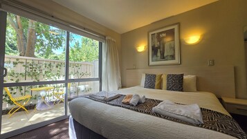 Luxury King Studio | Premium bedding, desk, soundproofing, iron/ironing board