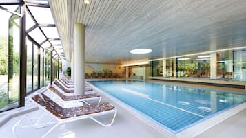 Indoor pool, open 7:00 AM to 8:00 PM, pool loungers