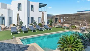 Outdoor pool, pool umbrellas, pool loungers