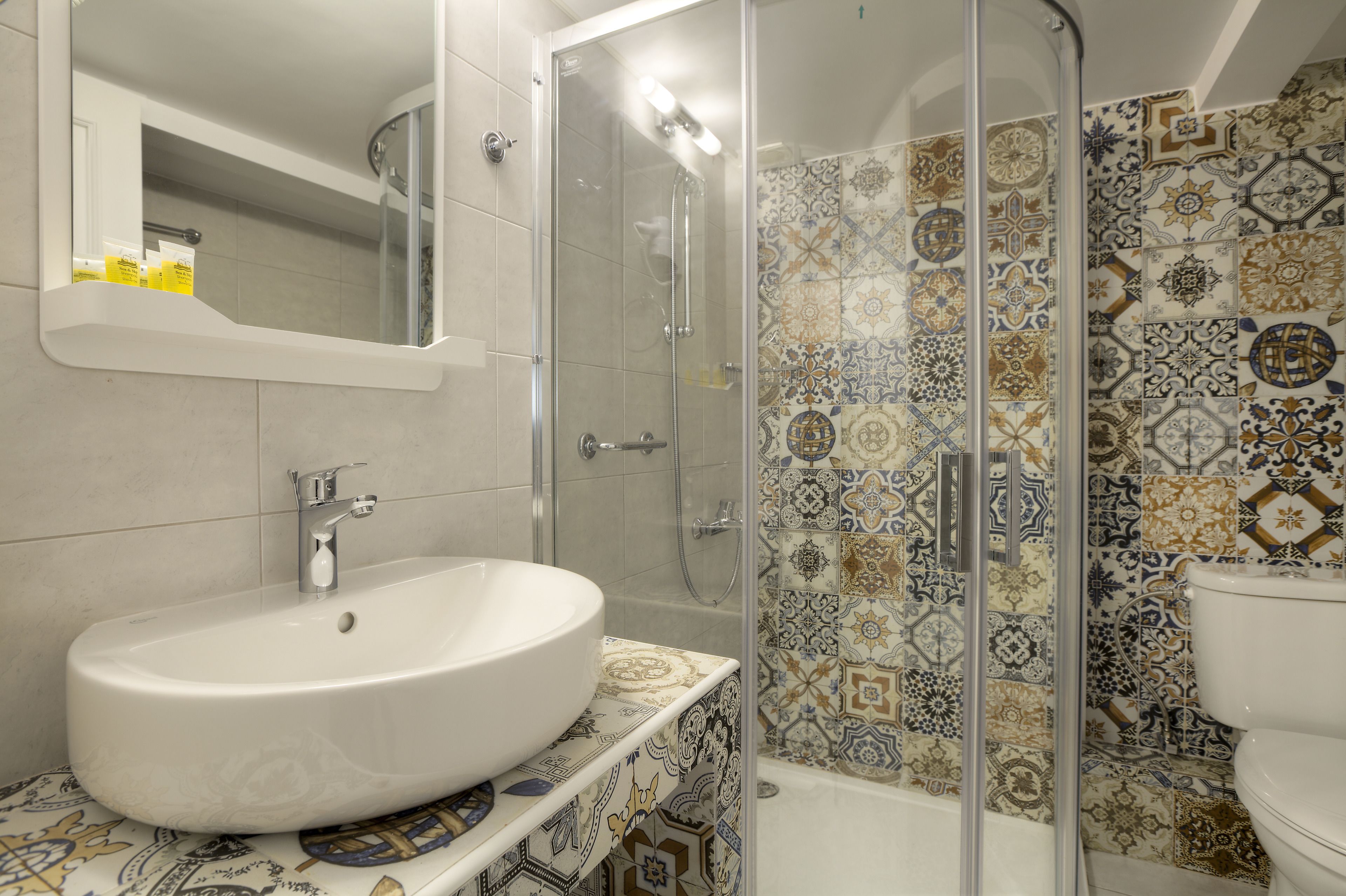 family room | bathroom | shower, designer toiletries, hair dryer, towels
