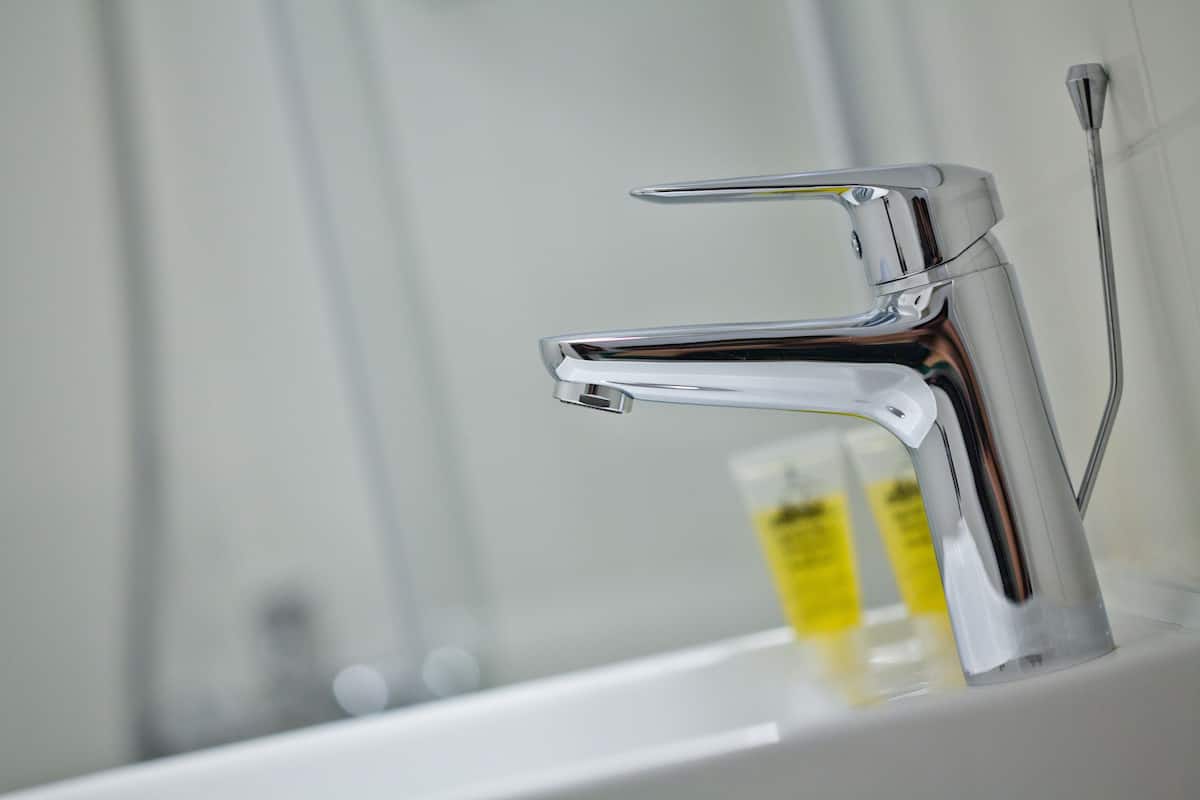 shower, designer toiletries, hair dryer, towels