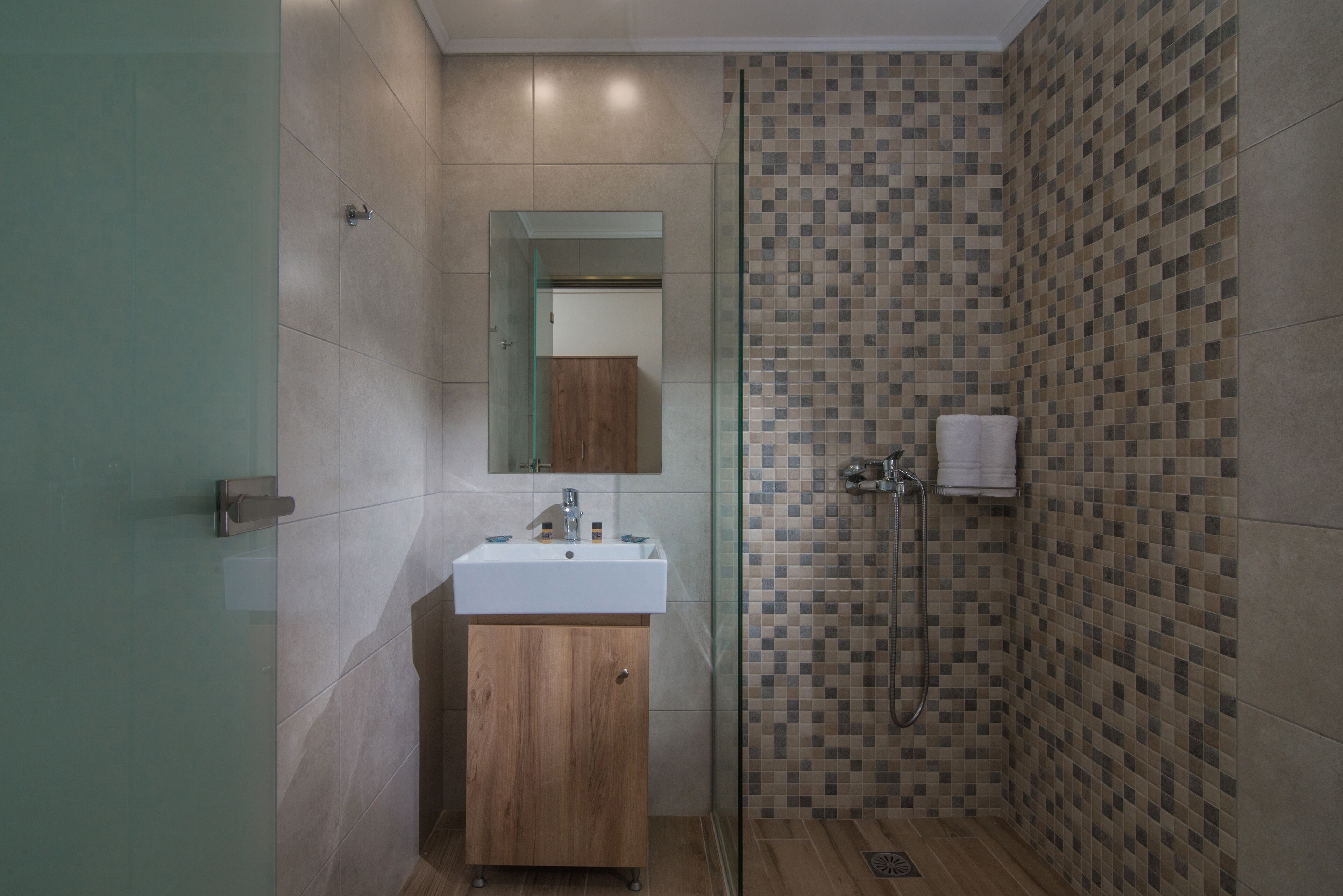 double or twin room, sea view | bathroom | shower, hair dryer, towels