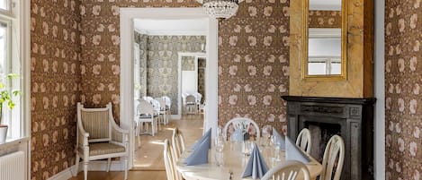 Dinner served, Scandinavian cuisine, garden views