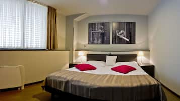 Hypo-allergenic bedding, minibar, in-room safe, soundproofing