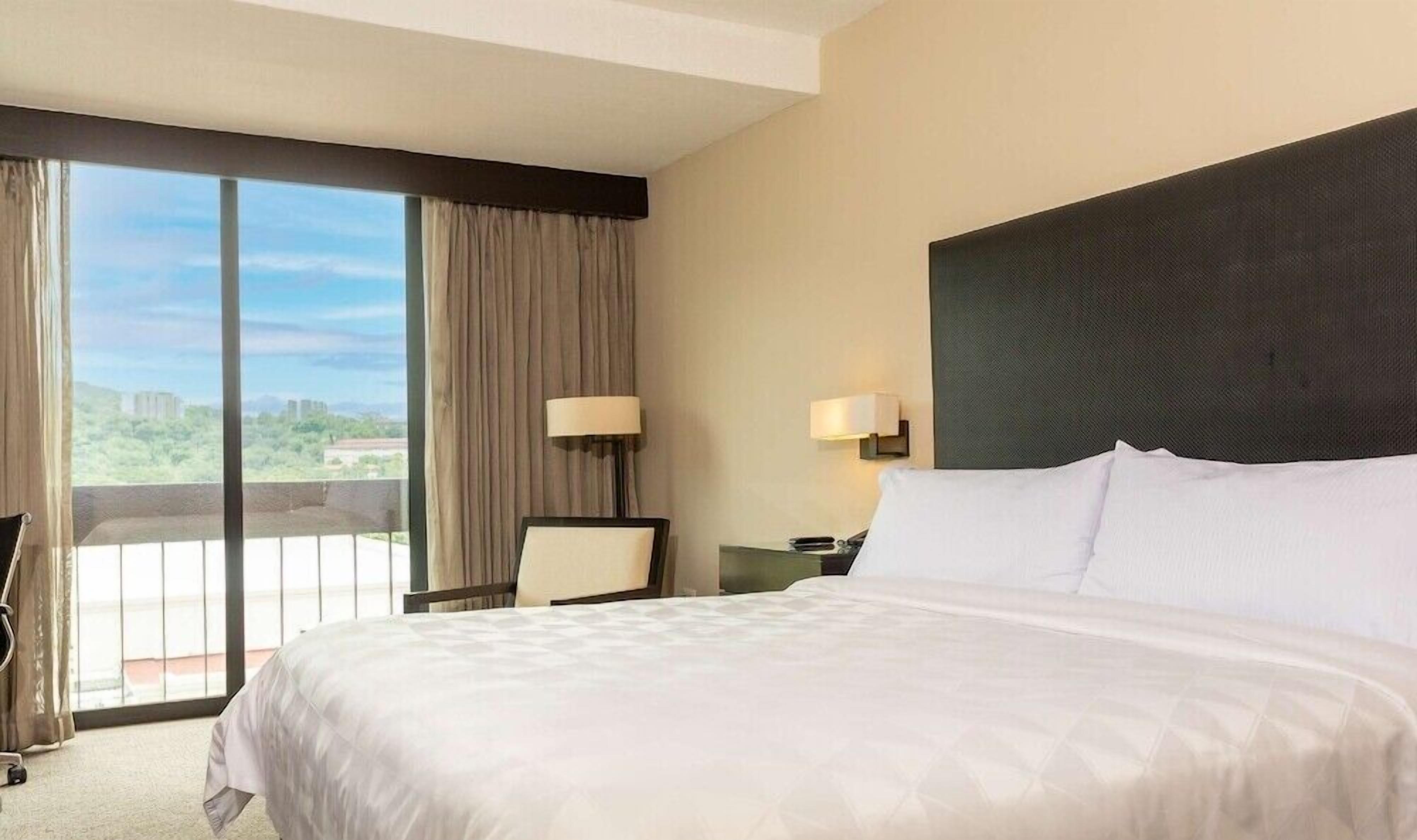 In-room safe, desk, laptop workspace, blackout drapes