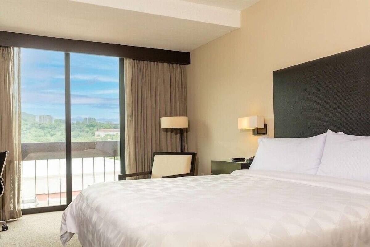In-room safe, desk, laptop workspace, blackout curtains