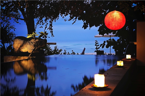 Indoor pool, outdoor pool, pool umbrellas, pool loungers