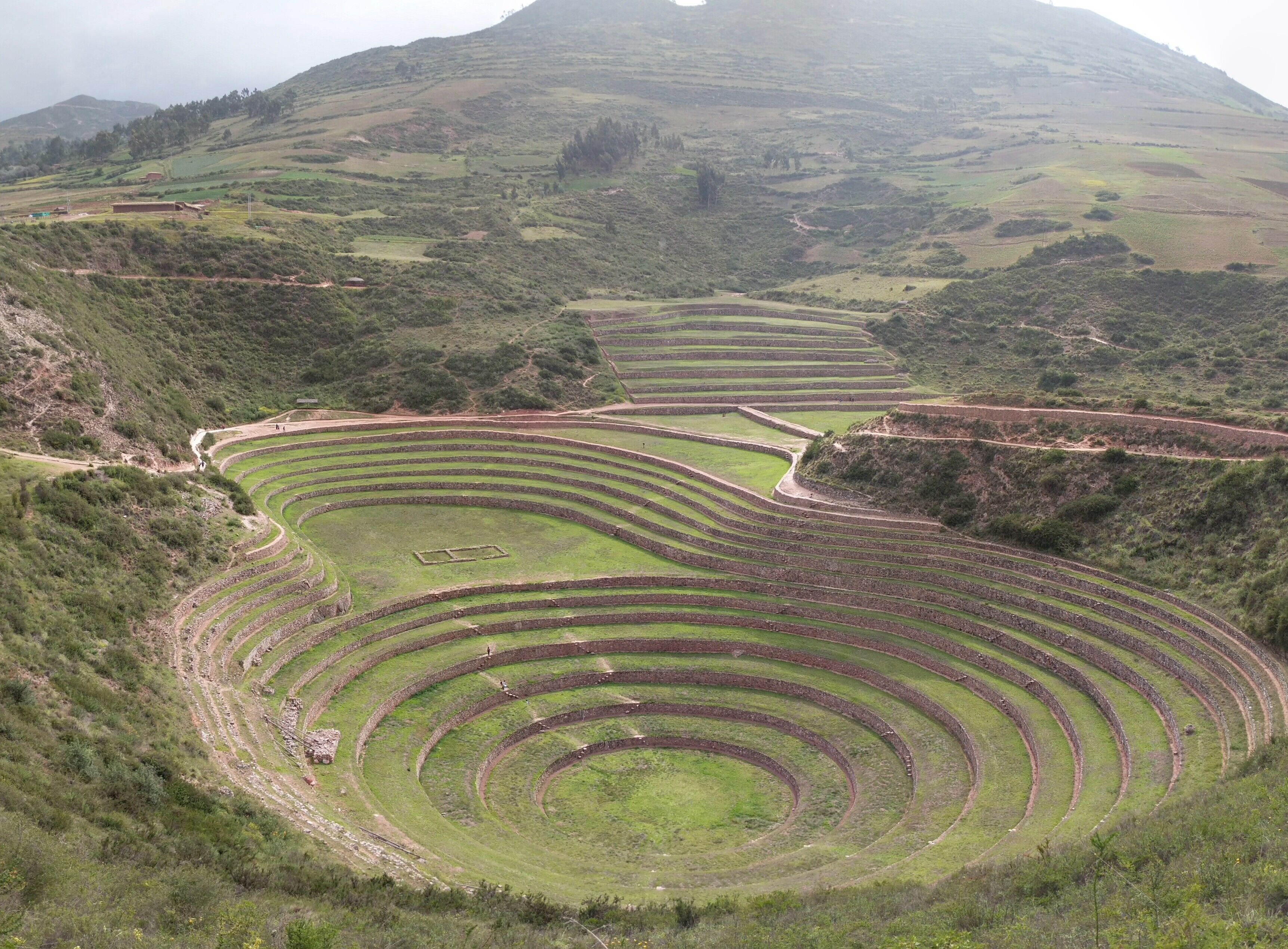 A terraced agricultural landscape with multiple levels of cultivation.