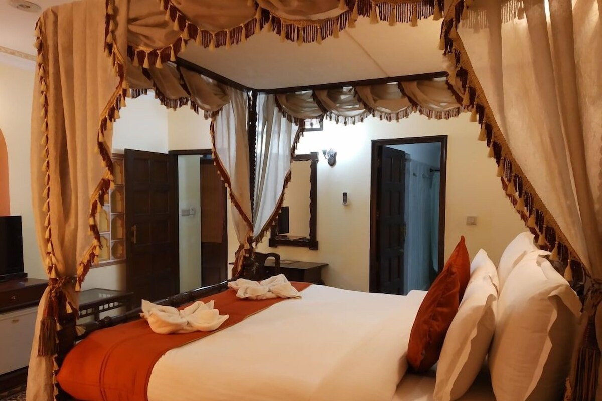 Premium bedding, memory-foam beds, desk, blackout curtains