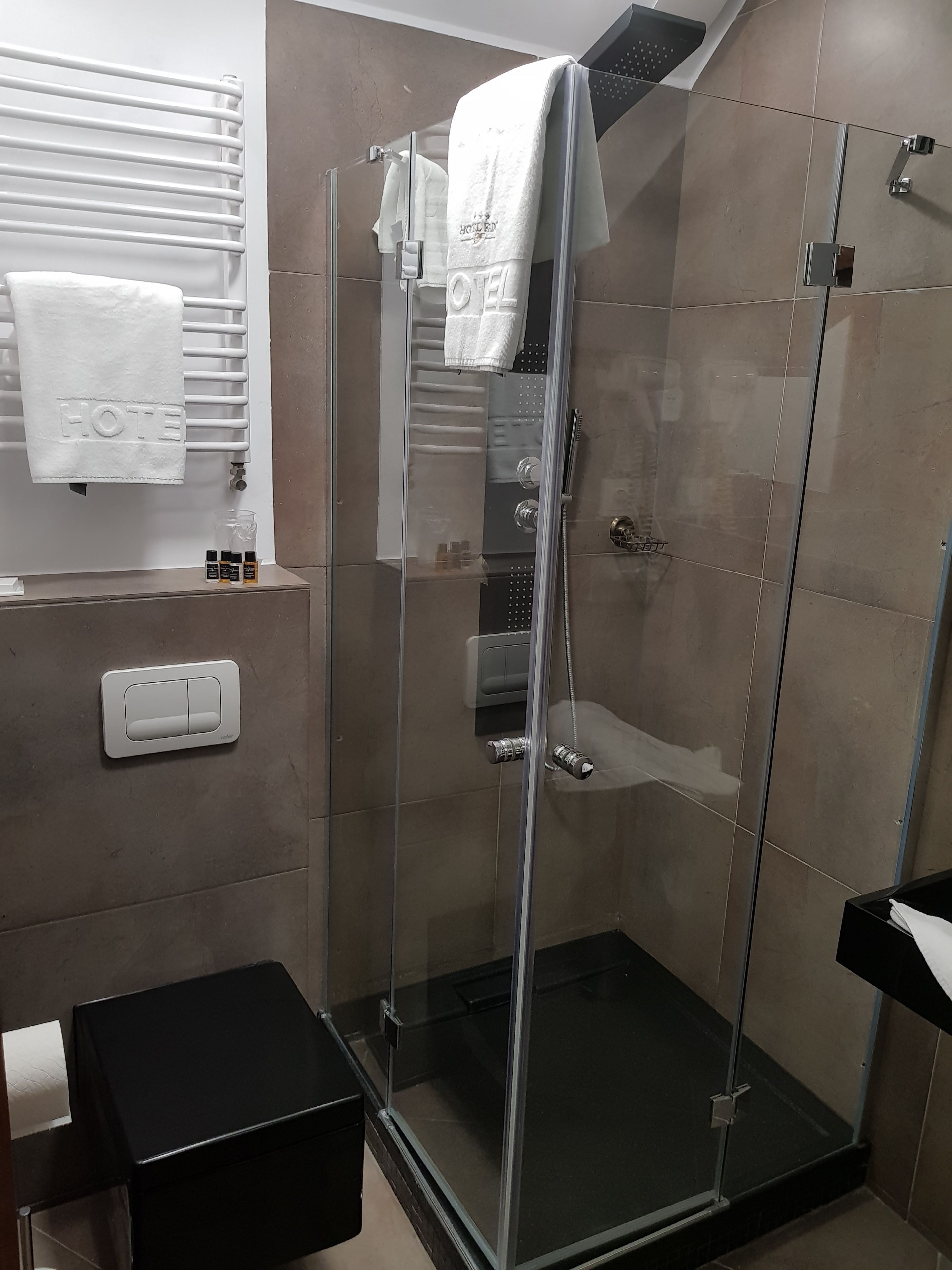 superior double or twin room | bathroom | shower, hair dryer, towels