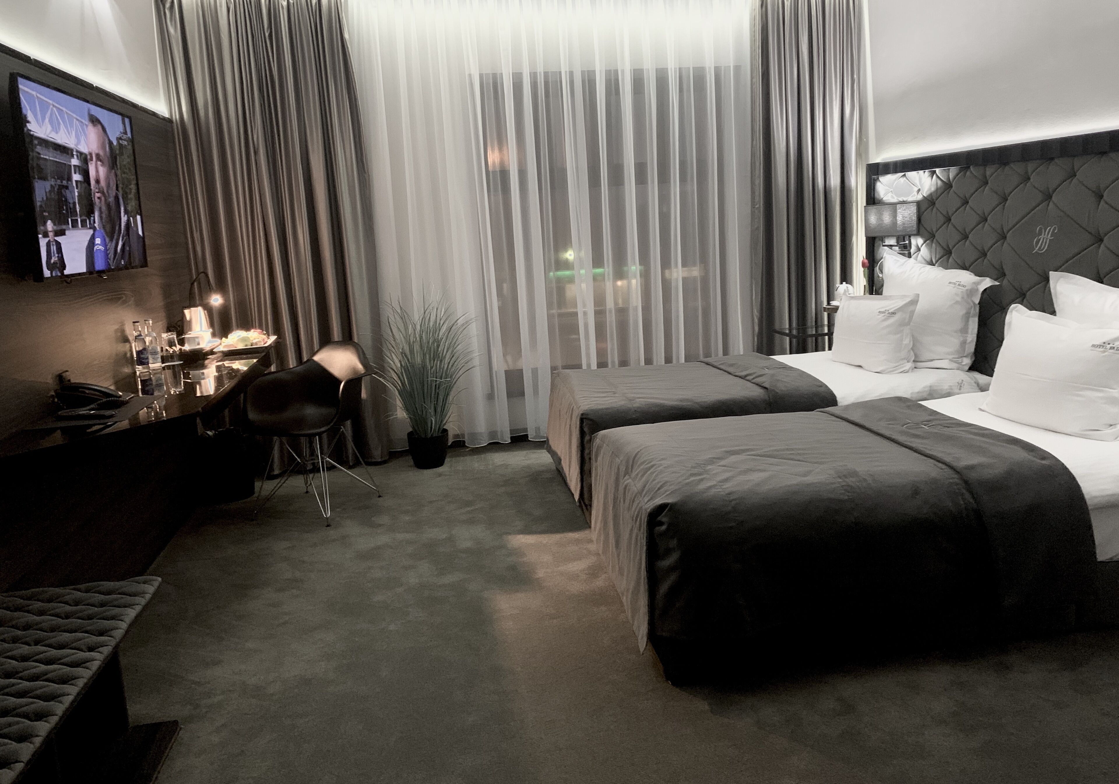 superior double or twin room | living area | 55-inch tv with satellite channels